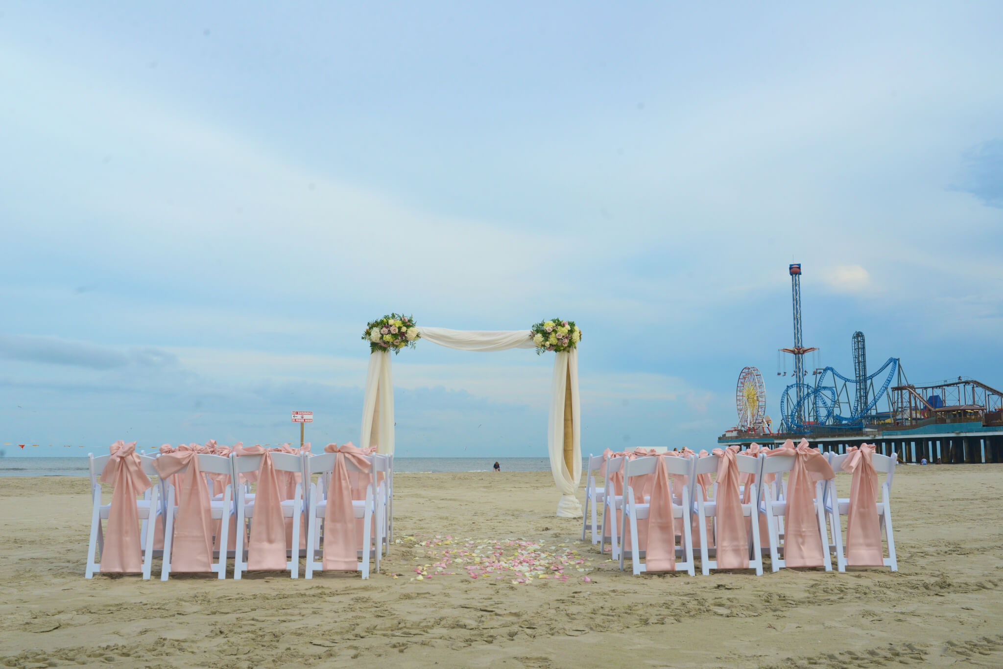 Galveston Intimate Wedding Setup – Bamboo Arch with Floral Accents