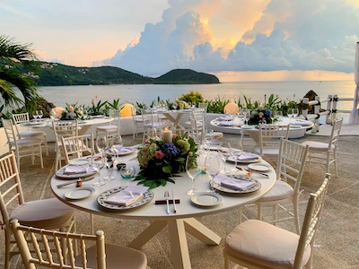 Small beach wedding ceremony in Ixtapa, Zihuatanejo La Casa Que Canta with calm waters.